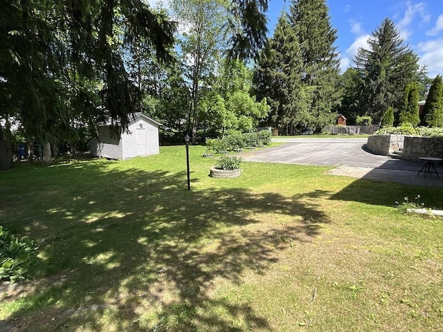412 Worcester St, West Boylston, MA 01583 - view of green lawn with a storage shed