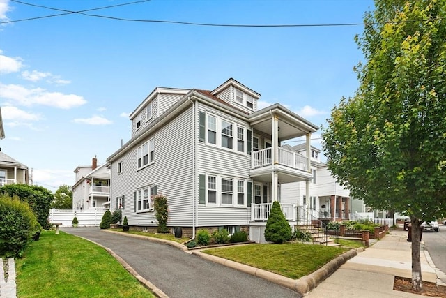 130 Francis St, Everett, MA 02149 - view of front of home featuring a balcony