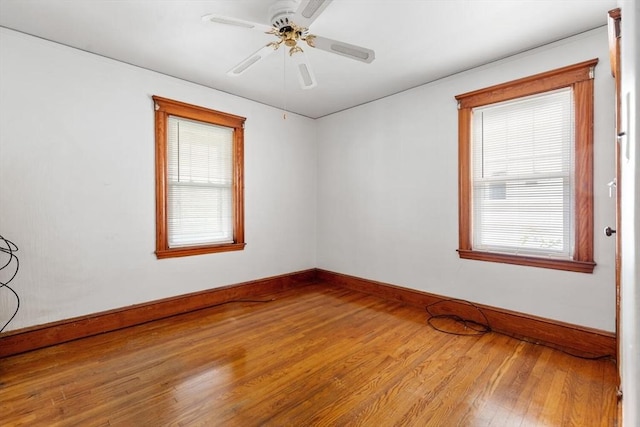 130 Francis St, Everett, MA 02149 - unfurnished room with wood finished floors and ceiling fan