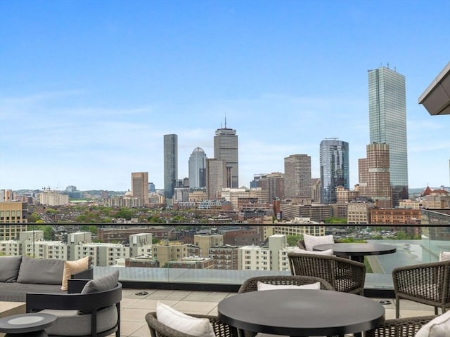 100 Shawmut Ave Unit 709, Boston, MA 02118 - view of patio / terrace featuring an outdoor living space, a skyline view, and a balcony
