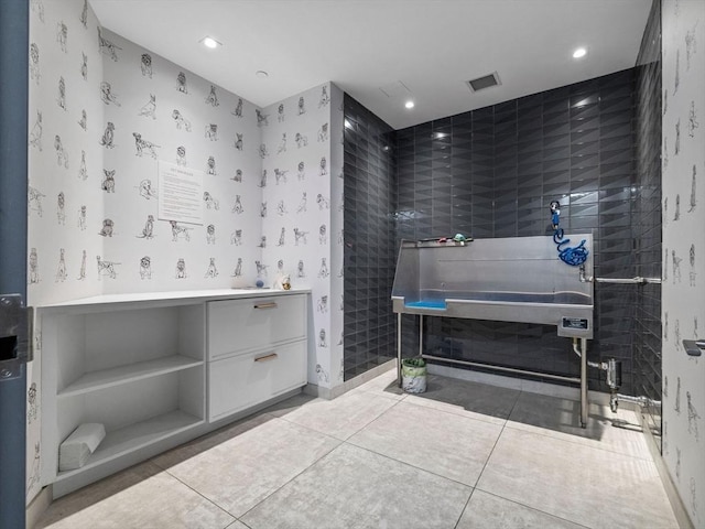100 Shawmut Ave Unit 709, Boston, MA 02118 - misc room featuring tile patterned flooring, pet washing station, and recessed lighting