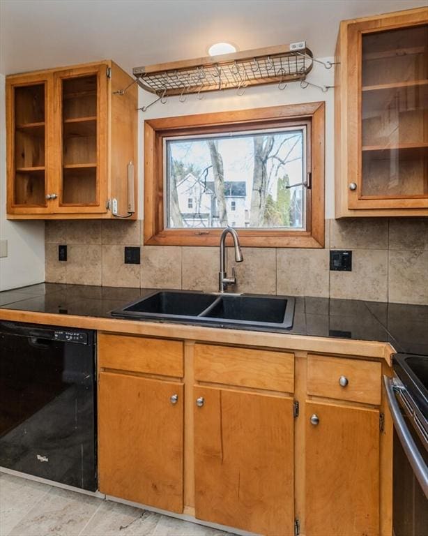 kitchen featuring a sink, decorative backsplash, glass insert cabinets, dishwasher, and brown cabinets