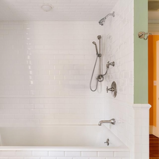 full bath featuring shower / tub combination