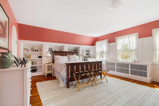 bedroom featuring wood finished floors