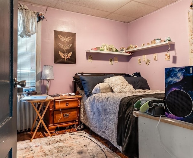 bedroom with a drop ceiling