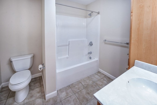 full bathroom featuring tile patterned floors, vanity, bathtub / shower combination, and toilet