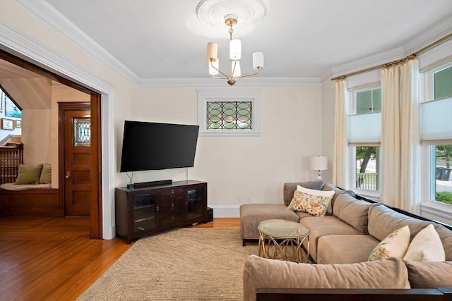 9 Arlington Rd, Woburn, MA 01801 - living area with ornamental molding, a chandelier, and wood finished floors