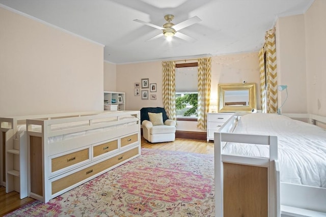 9 Arlington Rd, Woburn, MA 01801 - bedroom with wood finished floors, crown molding, and a ceiling fan