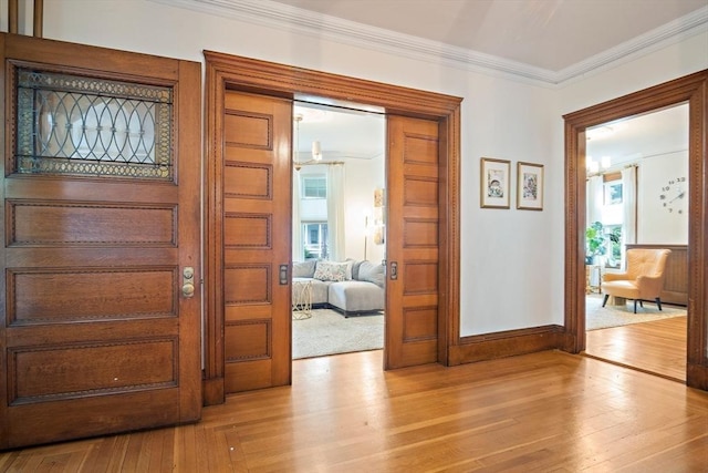 9 Arlington Rd, Woburn, MA 01801 - foyer entrance featuring ornamental molding and light wood-style floors