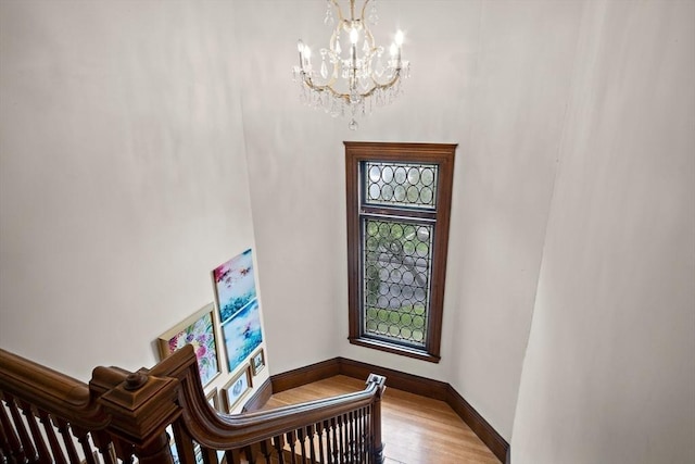 9 Arlington Rd, Woburn, MA 01801 - stairs with a chandelier and wood finished floors