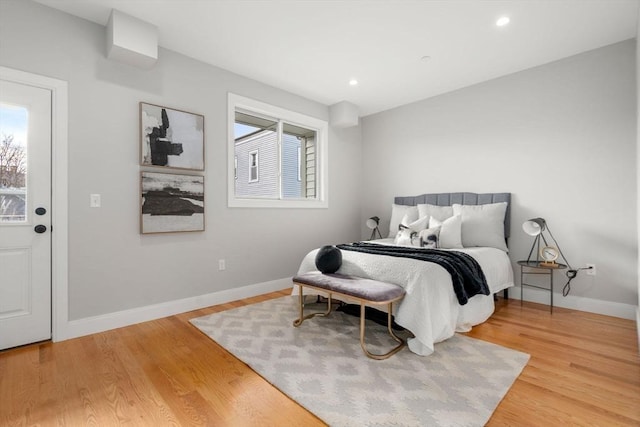 123-125 Centre St Unit Th4, Boston, MA 02124 - bedroom with light wood-style floors, recessed lighting, and baseboards