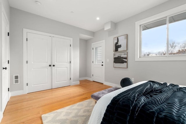 123-125 Centre St Unit Th4, Boston, MA 02124 - bedroom with visible vents, recessed lighting, light wood-style floors, and baseboards