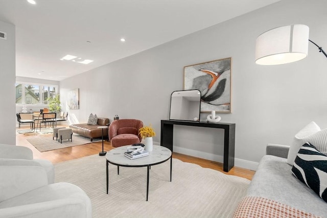 123-125 Centre St Unit Th4, Boston, MA 02124 - living area with baseboards, recessed lighting, wood finished floors, and visible vents