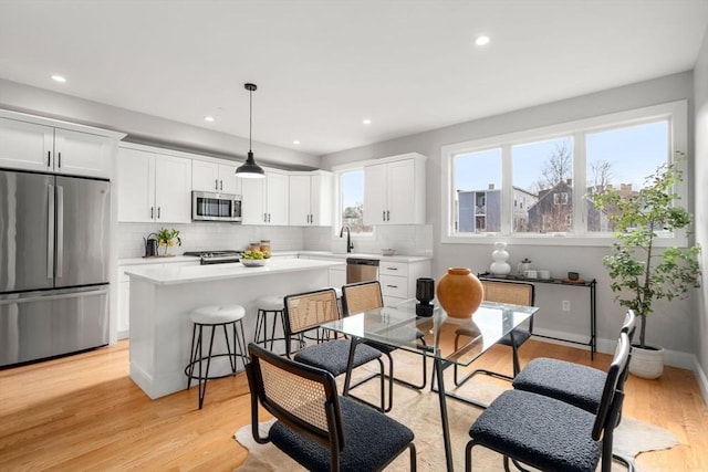 123-125 Centre St Unit Th4, Boston, MA 02124 - dining area featuring recessed lighting and light wood-type flooring