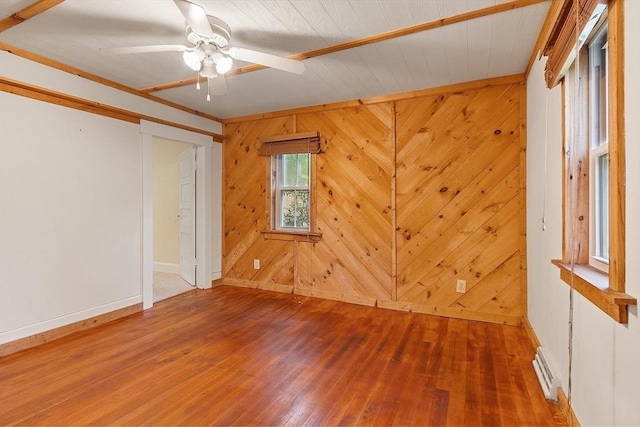10 Worcester Rd, Townsend, MA 01469 - spare room featuring wood finished floors, a ceiling fan, baseboards, and wood walls