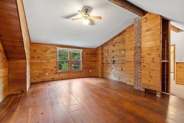 10 Worcester Rd, Townsend, MA 01469 - additional living space with wood walls, hardwood / wood-style floors, and a ceiling fan