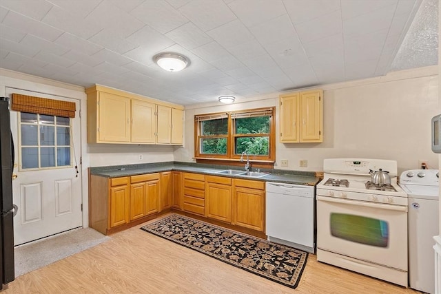 10 Worcester Rd, Townsend, MA 01469 - kitchen featuring white appliances, a sink, washer / clothes dryer, light wood finished floors, and dark countertops