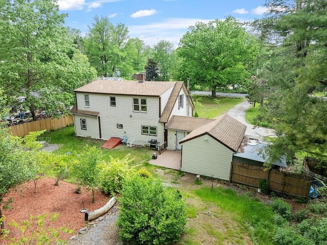 10 Worcester Rd, Townsend, MA 01469 - back of house featuring a wooden deck, a shingled roof, and a chimney