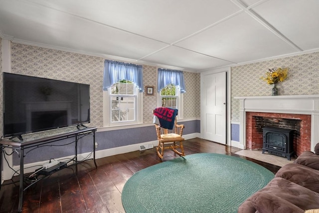 19 E St, Grafton, MA 01536 - living area featuring wood-type flooring, a wood stove, wallpapered walls, and crown molding