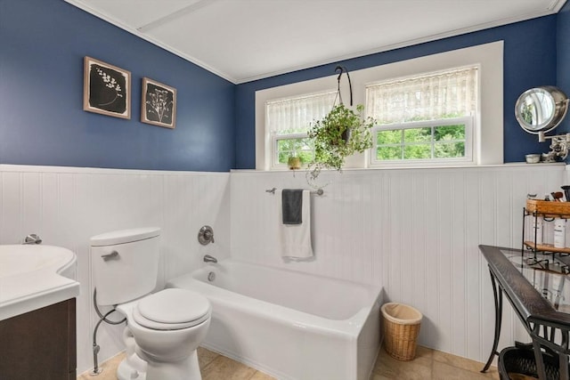 19 E St, Grafton, MA 01536 - full bathroom with wainscoting, a bath, vanity, and tile patterned flooring