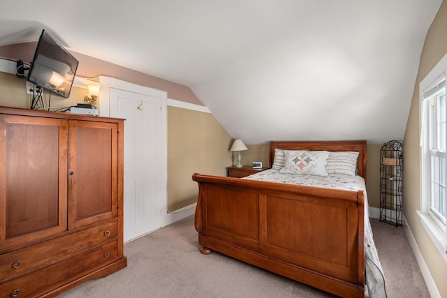 19 E St, Grafton, MA 01536 - bedroom with light colored carpet, lofted ceiling, and multiple windows