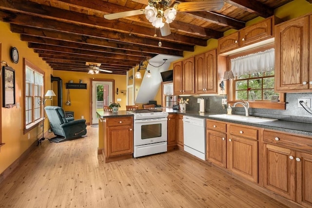 19 E St, Grafton, MA 01536 - kitchen with white appliances, a ceiling fan, a peninsula, plenty of natural light, and a wooden ceiling with exposed beams