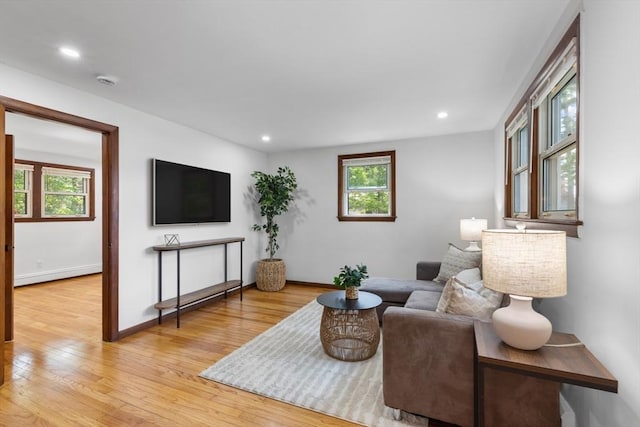 268 Pine St, Tewksbury, MA 01876 - living room with baseboard heating, light wood-type flooring, and recessed lighting