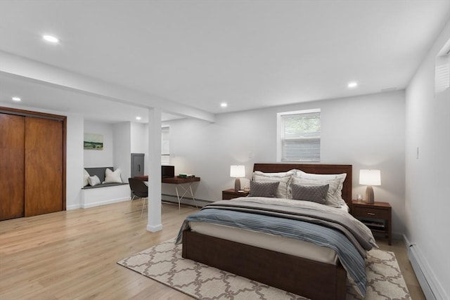 268 Pine St, Tewksbury, MA 01876 - bedroom featuring a baseboard radiator, light wood-style floors, and recessed lighting