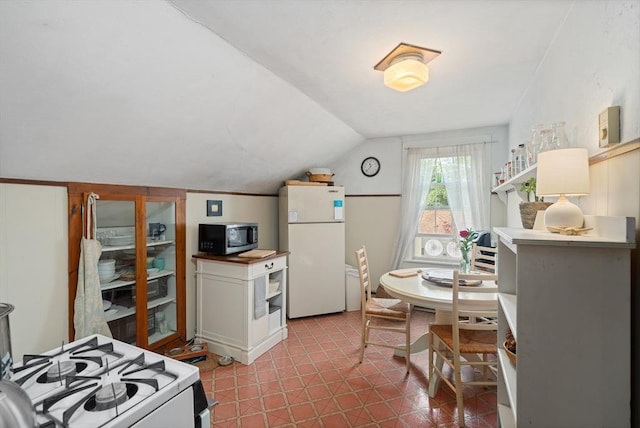85 Everett St, Southbridge, MA 01550 - kitchen featuring white appliances, vaulted ceiling, and open shelves