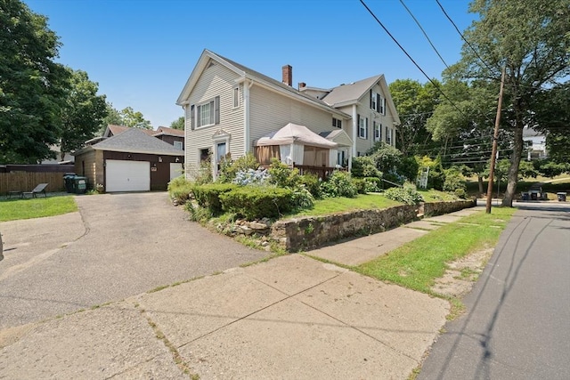 85 Everett St, Southbridge, MA 01550 - view of front of house with asphalt driveway and a chimney