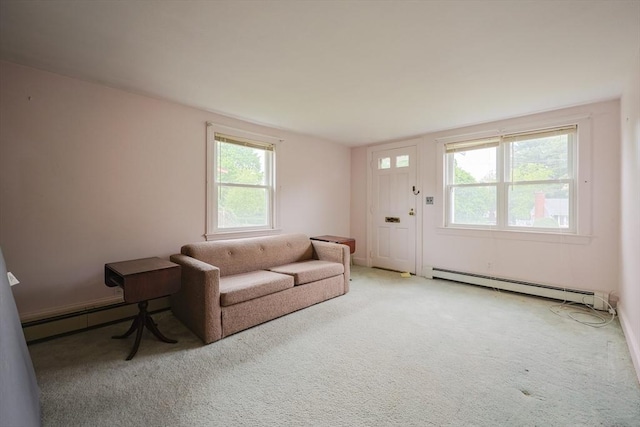 26 Presidents Rd, Weymouth, MA 02188 - living area with a baseboard radiator and carpet