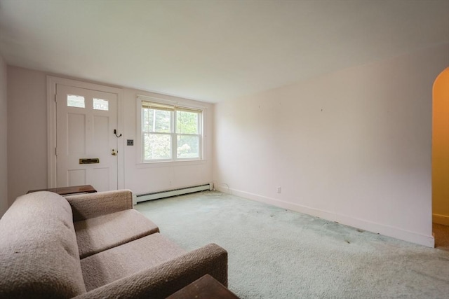 26 Presidents Rd, Weymouth, MA 02188 - living room featuring a baseboard heating unit, light carpet, and baseboards