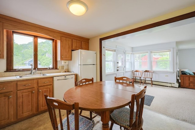 26 Presidents Rd, Weymouth, MA 02188 - kitchen featuring a sink, white appliances, light countertops, brown cabinetry, and a baseboard radiator