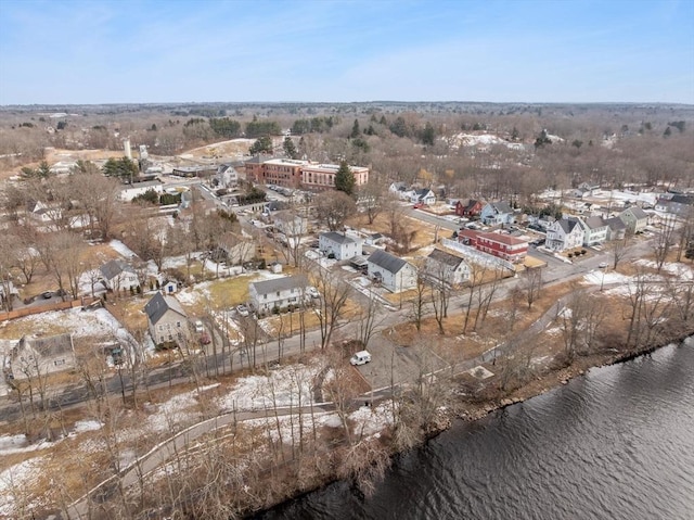 birds eye view of property featuring a water view and a residential view