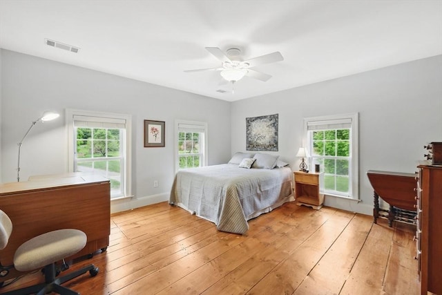 39 Cook Rd, Southampton, MA 01073 - bedroom featuring multiple windows, light wood finished floors, ceiling fan, and baseboards