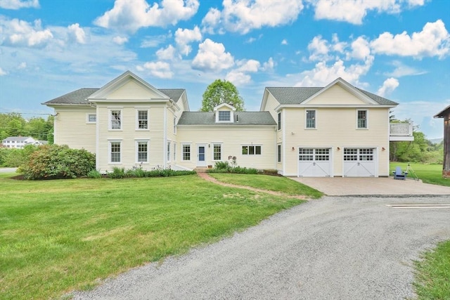 39 Cook Rd, Southampton, MA 01073 - back of house with gravel driveway, an attached garage, and a yard
