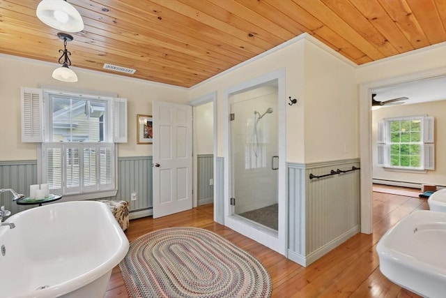 39 Cook Rd, Southampton, MA 01073 - bathroom with wainscoting, wooden ceiling, a stall shower, hardwood / wood-style floors, and a soaking tub