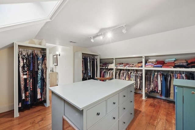 39 Cook Rd, Southampton, MA 01073 - walk in closet featuring light wood-type flooring and vaulted ceiling