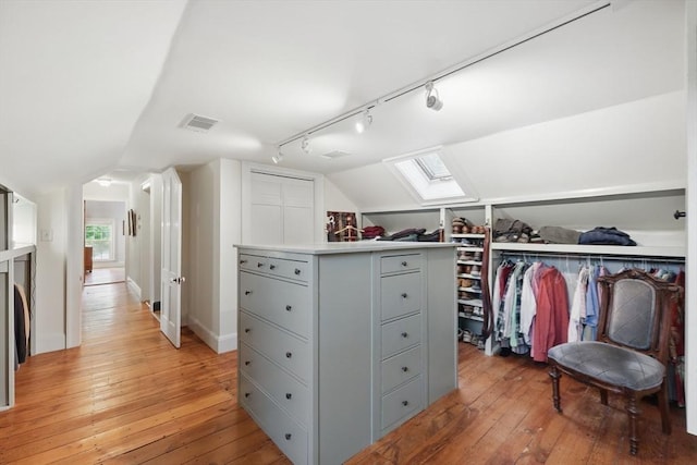 39 Cook Rd, Southampton, MA 01073 - spacious closet with a skylight, light wood-type flooring, and lofted ceiling