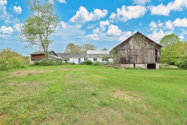 39 Cook Rd, Southampton, MA 01073 - view of green lawn with a barn and an outbuilding