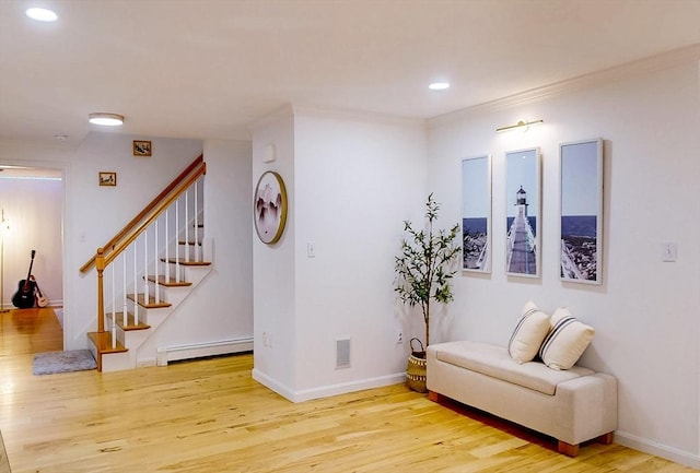 79 Charter Rd, Acton, MA 01720 - living area with a baseboard radiator, wood finished floors, stairs, recessed lighting, and baseboards