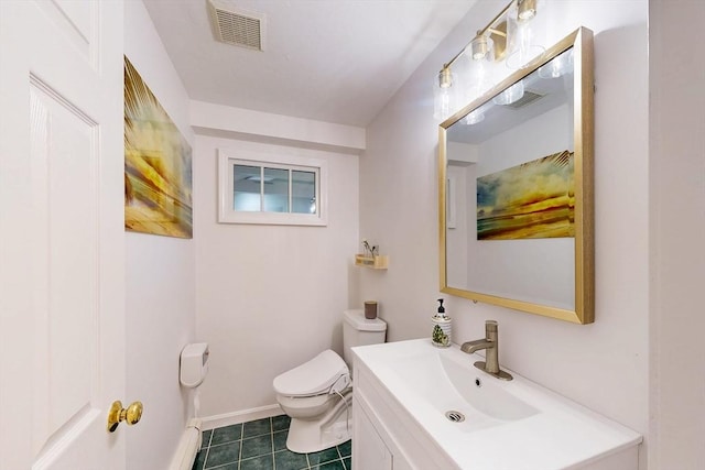 79 Charter Rd, Acton, MA 01720 - bathroom featuring toilet, vanity, tile patterned floors, and baseboards