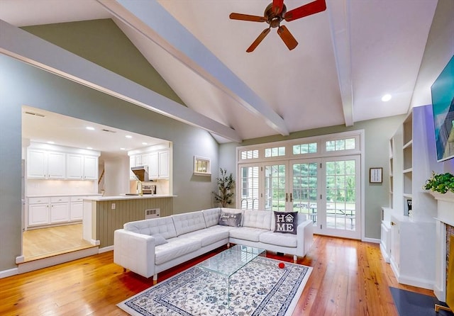 79 Charter Rd, Acton, MA 01720 - living area with a ceiling fan, light wood-type flooring, beam ceiling, baseboards, and built in features