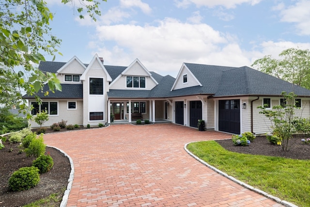 view of front of property with a garage