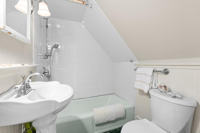 148-150 Pleasant St Unit 2, Marblehead, MA 01945 - full bathroom with toilet, a sink, shower / washtub combination, and lofted ceiling