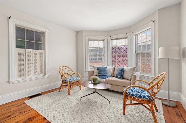 148-150 Pleasant St Unit 2, Marblehead, MA 01945 - living room with baseboards and wood finished floors