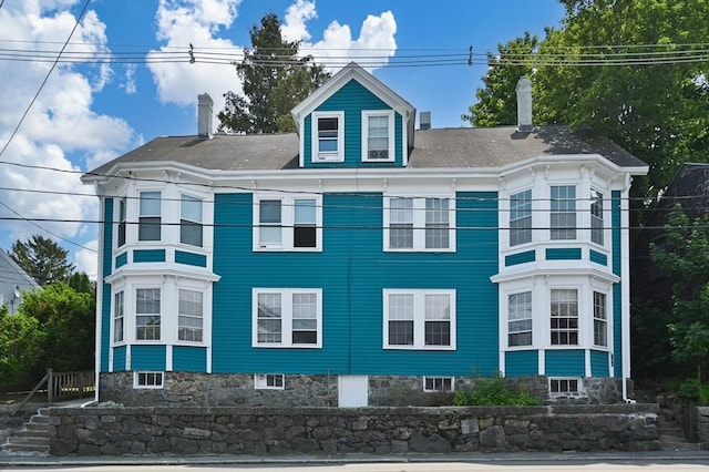 148-150 Pleasant St Unit 2, Marblehead, MA 01945 - view of front facade with a chimney and a balcony