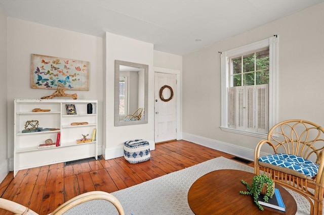 148-150 Pleasant St Unit 2, Marblehead, MA 01945 - living area with baseboards and wood-type flooring