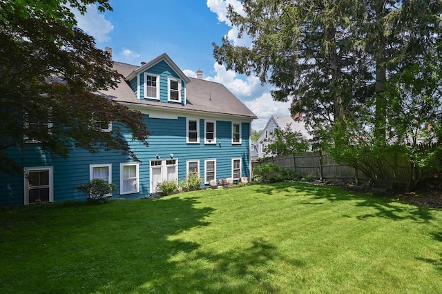 148-150 Pleasant St Unit 2, Marblehead, MA 01945 - back of property with a chimney