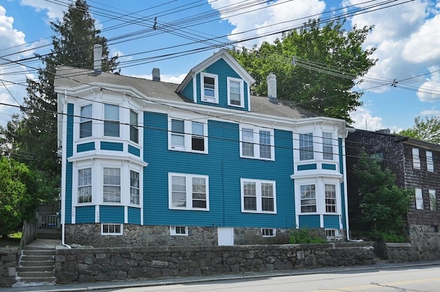 148-150 Pleasant St Unit 2, Marblehead, MA 01945 - view of side of property featuring a chimney